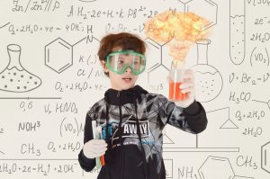 student doing chemistry experiment